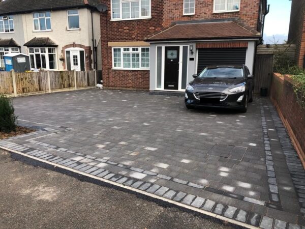Charcoal Tegula Paving Driveway with Matching Border in Chelmsford