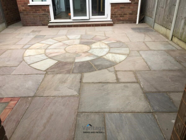 Sandstone Patio with Circular Insert in Chelmsford