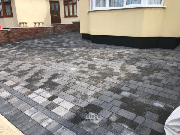 Tegula Paved Driveway and Patio with Flower Beds and Artificial…