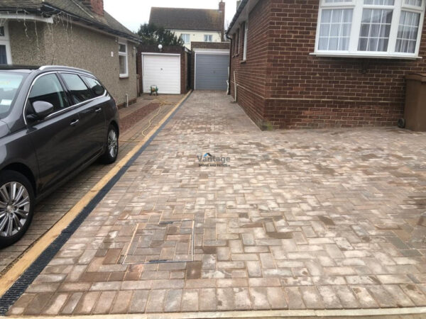Bracken Block Paved Driveway and Patio with Yorkshire Turf in…