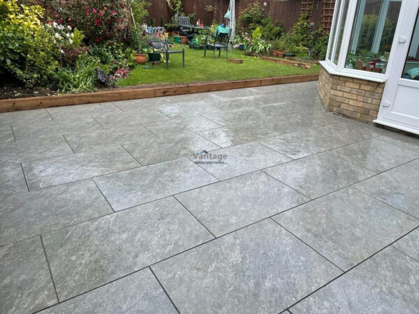 Patio with Porcelain Slabs, Railway Sleepers and Granite Pathway in Chelmsford, Essex