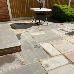 Indian Sandstone Slabbed Patio with Step in Ongar, Essex