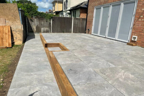 Tegula Paved Driveway with Fencing and Porcelain Tiled Patio in…