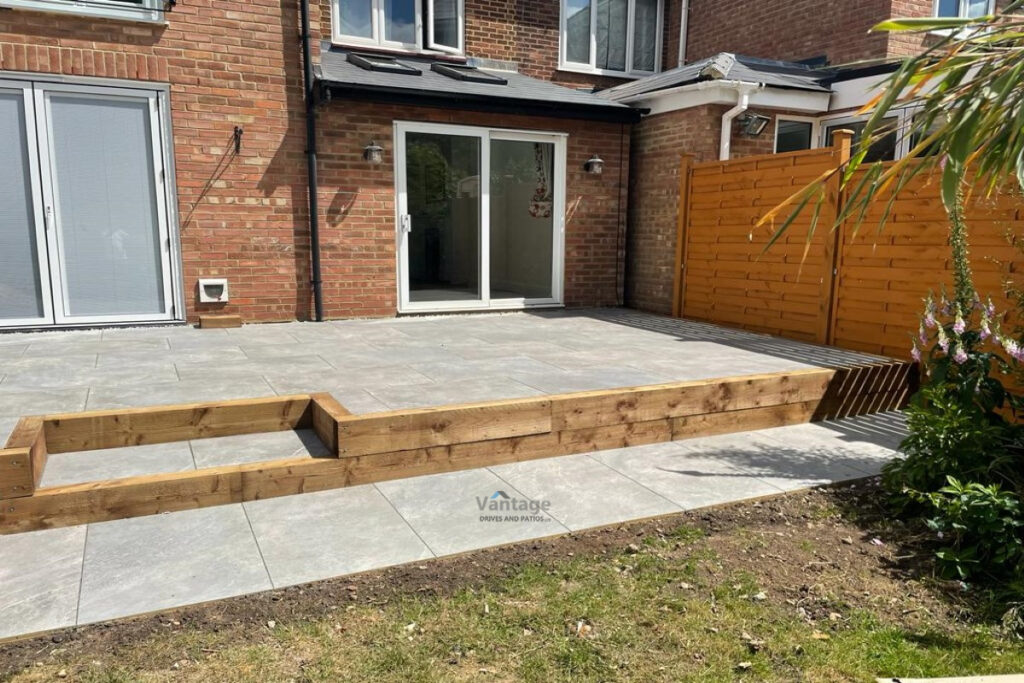 Tegula Paved Driveway with Fencing and Porcelain Tiled Patio in Chelmsford