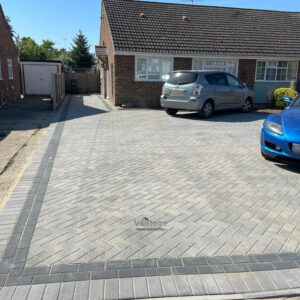 Ash Block Paved Driveway with Charcoal Staggered Border and Sleeper Edging in Braintree, Essex (6)