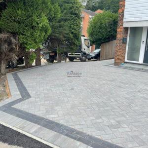 Driveway with Ash Block Paving, Charcoal Barleystone Border and Indian…