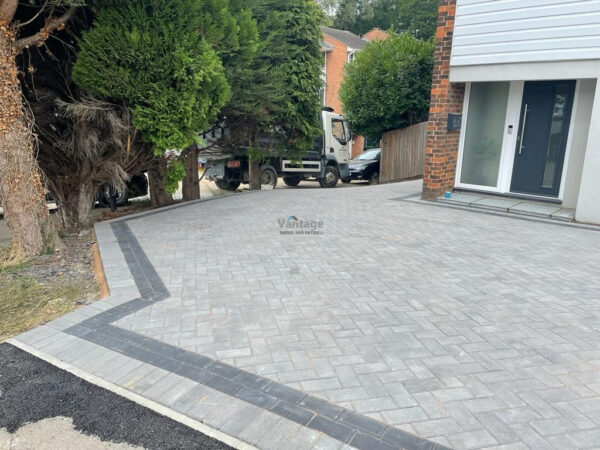 Driveway with Ash Block Paving, Charcoal Barleystone Border and Indian…