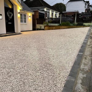 Driveway with Cotswold Gravel and Tegula Paved Border in Billericay