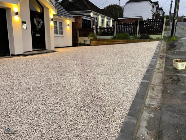 Driveway with Cotswold Gravel and Tegula Paved Border in Billericay