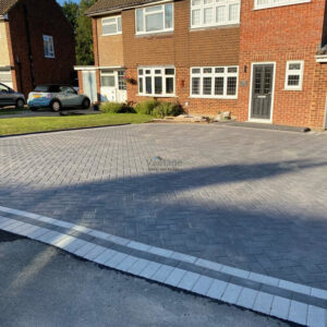 Driveway with Carbon Charcoal Block Paving and Grey Border in…