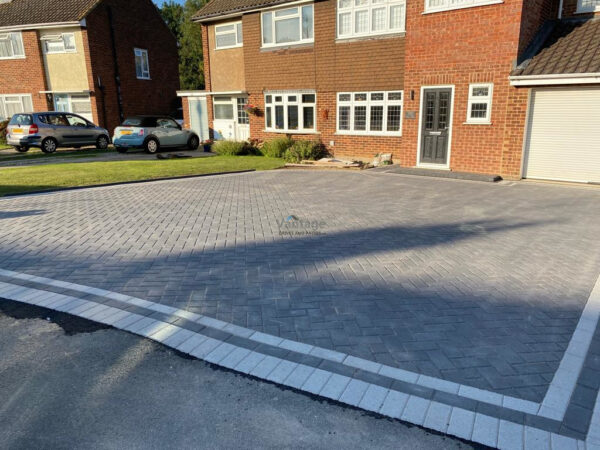 Driveway with Carbon Charcoal Block Paving and Grey Border in…